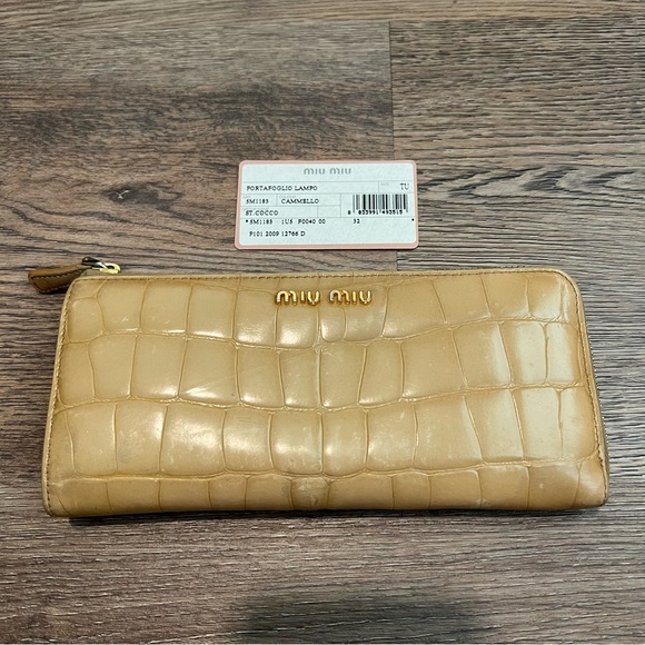 Miu Miu long wallet in crocodile-embossed leather and a light